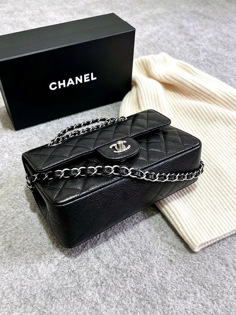 CHANEL Classic Flap Bag in Black Caviar Leather